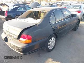 1999 Nissan Altima XE with VIN 1N4DL01D1XC226461, listed as a IAAI auction lot 41449355 with 193,000 mi miles. Bid and sale history available at carsss.com. Image 4.