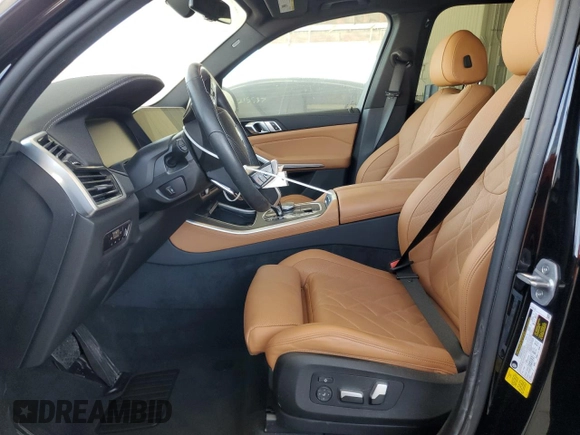 2023 BMW X5 sDrive40i with VIN 5UXCR4C05P9R70324, listed as a Copart auction lot 54661245 with 13,136 mi miles and Salvage title. Bid and sale history available at DreamBid. Image 7.
