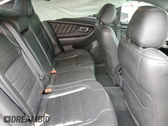 2014 Ford Taurus SHO z VIN 1FAHP2KT4EG106957, wystawiony jako Copart lot #59364185 z przebiegiem 113 704 mil mil oraz Szkoda całkowita • Salvage title. Historia ofert i sprzedaży dostępna na DreamBid. Obrazek 10.