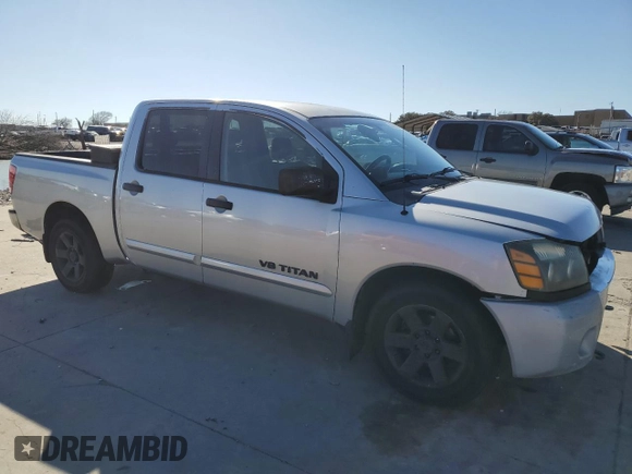 2007 Nissan Titan XE with VIN 1N6BA07A17N218723, listed as a Copart auction lot 43451135 with 202,747 mi miles and Salvage Title. Bid and sale history available at carsss.com. Image 4.