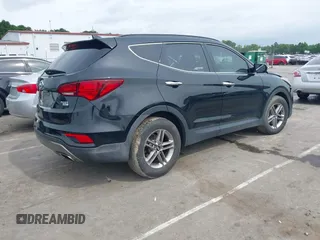2017 Hyundai Santa Fe 2.4L with VIN 5NMZUDLB0HH037142, listed as a IAAI auction lot 42323880 with 87,396 mi miles and . Bid and sale history available at DreamBid. Image 4.
