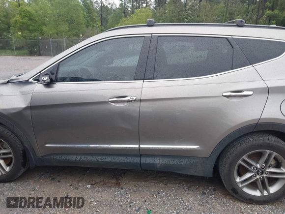 2017 Hyundai Santa Fe 2.4L z VIN 5XYZU3LB8HG421397, wystawiony jako IAAI lot #41961915 z przebiegiem 102 594 mil mil oraz . Historia ofert i sprzedaży dostępna na DreamBid. Obrazek 14.