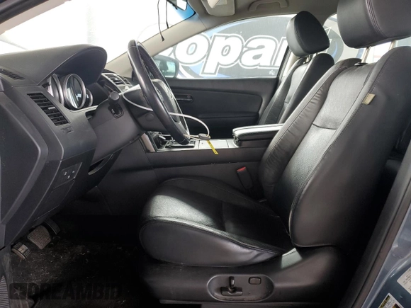 2015 Mazda CX-9 Touring z VIN JM3TB3CV2F0467257, wystawiony jako Copart lot #55896725 z przebiegiem 146 877 mil mil oraz Czysty tytuł • Clean title. Historia ofert i sprzedaży dostępna na DreamBid. Obrazek 7.