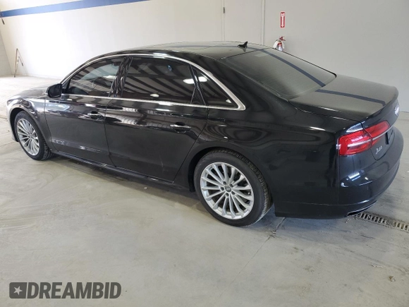 2016 Audi A8 Sport z VIN WAU43AFD1GN011589, wystawiony jako Copart lot #86614934 z przebiegiem 96 137 mil mil oraz Szkoda całkowita • Salvage title. Historia ofert i sprzedaży dostępna na DreamBid. Obrazek 2.