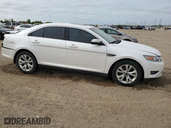 2012 Ford Taurus SEL z VIN 1FAHP2EW8CG138653, wystawiony jako Copart lot #56750215 z przebiegiem 159 631 mil mil oraz Szkoda całkowita • Salvage title. Historia ofert i sprzedaży dostępna na DreamBid. Obrazek 4.
