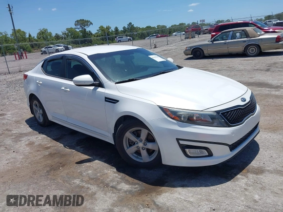 2015 Kia Optima LX z VIN KNAGM4A79F5530434, wystawiony jako IAAI lot #42145100 z przebiegiem 171 477 mil mil oraz . Historia ofert i sprzedaży dostępna na DreamBid. Obrazek 1.