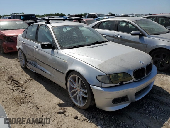 2004 BMW 3 Series 325xi with VIN WBAEU33404PM60151, listed as a Copart auction lot 57120235 with 116,859 mi miles and Salvage title. Bid and sale history available at DreamBid. Image 4.