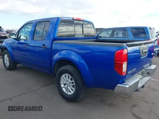 2014 Nissan Frontier SV with VIN 1N6AD0ER1EN765693, listed as a IAAI auction lot 41560914 with 165,572 mi miles and . Bid and sale history available at DreamBid. Image 3.