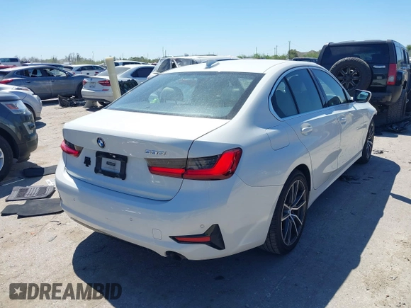 2019 BMW 3 Series 330i with VIN WBA5R1C58KAK07061, listed as a IAAI auction lot 41843706 with 57,930 mi miles and . Bid and sale history available at DreamBid. Image 4.