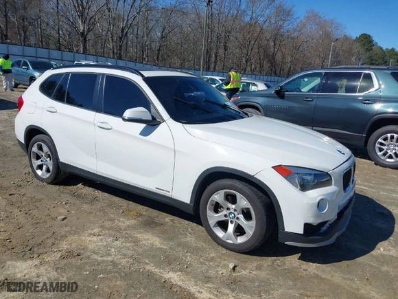 2015 BMW X1 sDrive28i with VIN WBAVM1C53FV317173, listed as a IAAI auction lot 41586385 with 146,068 mi miles. Bid and sale history available at carsss.com. Image 1.