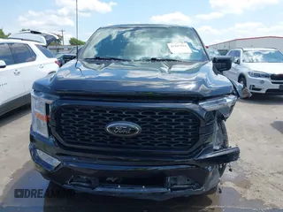 2022 Ford F-150 XL with VIN 1FTFW1E5XNFC27087, listed as a IAAI auction lot 42207284 with 37,745 mi miles and . Bid and sale history available at DreamBid. Image 12.