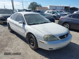 2003 Mercury Sable GS with VIN 1MEFM50U33A629599, listed as a IAAI auction lot 41579245 with 128,198 mi miles and . Bid and sale history available at DreamBid. Image 1.