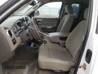2006 Mitsubishi Raider Duro Cross with VIN 1Z7HT32N66S529393, listed as a Copart auction lot 46796395 with 133,409 mi miles and Clean Title. Bid and sale history available at carsss.com. Image 7.