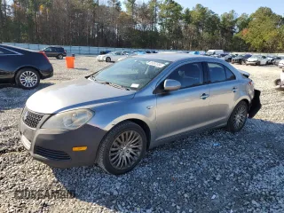 2011 Suzuki Kizashi SE z VIN JS2RE9A30B6110204, wystawiony jako Copart lot #85853384 z przebiegiem 168 962 mil mil oraz Szkody całkowita. Historia ofert i sprzedaży dostępna na DreamBid. Obrazek 1.