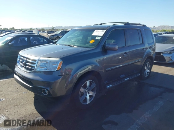 2014 Honda Pilot Touring z VIN 5FNYF4H90EB033259, wystawiony jako IAAI lot #42287774 z przebiegiem 115 416 mil mil oraz . Historia ofert i sprzedaży dostępna na DreamBid. Obrazek 17.