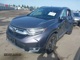 2018 Honda CR-V Touring with VIN 7FARW1H93JE027294, listed as a IAAI auction lot 41903484 with 80,999 mi miles and . Bid and sale history available at DreamBid. Image 23.