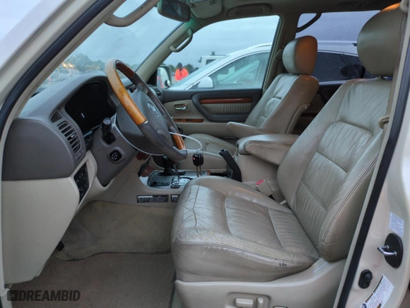 2004 Lexus LX 470 with VIN JTJHT00W243543558, listed as a Copart auction lot 74859974 with 189,556 mi miles and Salvage Title. Bid and sale history available at carsss.com. Image 7.