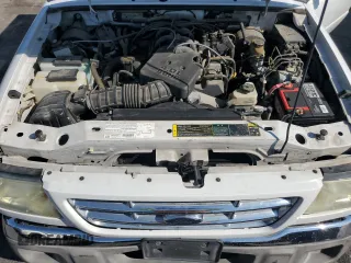 2003 Ford Ranger XLT Appearance z VIN 1FTYR44E23PB90515, wystawiony jako Copart lot #62690605 z przebiegiem 109 054 mil mil oraz Szkoda całkowita • Salvage title. Historia ofert i sprzedaży dostępna na DreamBid. Obrazek 11.