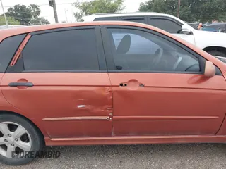 2009 Kia Spectra Spectra5 z VIN KNAFE241995024725, wystawiony jako IAAI lot #42193430 z przebiegiem 228 088 mil mil oraz . Historia ofert i sprzedaży dostępna na DreamBid. Obrazek 13.