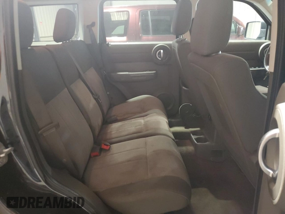 2008 Dodge Nitro SXT z VIN 1D8GT28K28W246131, wystawiony jako Copart lot #60037665 z przebiegiem 119 831 mil mil oraz Szkoda całkowita • Salvage title. Historia ofert i sprzedaży dostępna na DreamBid. Obrazek 11.