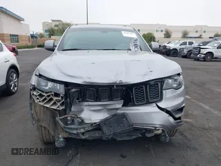 2016 Jeep Grand Cherokee Laredo z VIN 1C4RJFAG3GC457431, wystawiony jako IAAI lot #41993167 z przebiegiem 61 427 mil mil oraz . Historia ofert i sprzedaży dostępna na DreamBid. Obrazek 12.