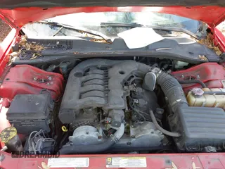 2009 Dodge Charger SXT with VIN 2B3KA33V49H556093, listed as a IAAI auction lot 42048956 with 164,284 mi miles. Bid and sale history available at carsss.com. Image 10.