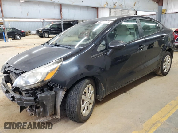 2012 Kia Rio LX with VIN KNADM4A34C6072811, listed as a Copart auction lot 68295334 with 77,167 mi miles and Salvage Title. Bid and sale history available at DreamBid. Image 1.