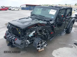 2021 Jeep Wrangler Unlimited Rubicon with VIN 1C4HJXFG7MW662092, listed as a IAAI auction lot 42139521 with 32,055 mi miles and . Bid and sale history available at DreamBid. Image 20.