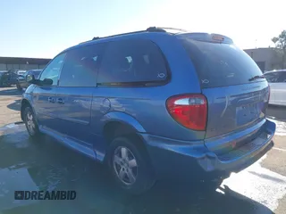 2007 Dodge Grand Caravan SXT with VIN 2D4GP44LX7R313906, listed as a IAAI auction lot 41402653 with 82,315 mi miles and . Bid and sale history available at DreamBid. Image 3.