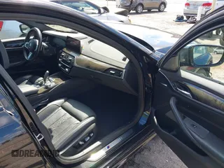 2019 BMW 5 Series M550i xDrive with VIN WBAJB9C51KB289355, listed as a IAAI auction lot 41867984 with 30,106 mi miles and . Bid and sale history available at DreamBid. Image 5.
