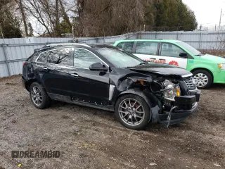 2016 Cadillac SRX Premium Collection with VIN 3GYFNGE3XGS555655, listed as a Copart auction lot 47911355 with 154,768 mi miles and Salvage title. Bid and sale history available at DreamBid. Image 4.