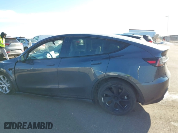 2023 Tesla Model Y Long Range with VIN 7SAYGAEEXPF714760, listed as a IAAI auction lot 41748398 with 49,802 mi miles and . Bid and sale history available at DreamBid. Image 15.