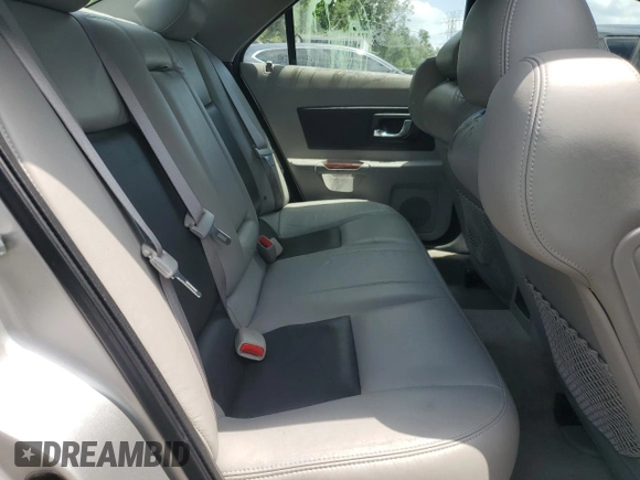 2006 Cadillac CTS with VIN 1G6DM57T860124659, listed as a Copart auction lot 57287985 with 141,162 mi miles and Salvage title. Bid and sale history available at DreamBid. Image 10.