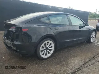2023 Tesla Model 3 with VIN 5YJ3E1EA8PF438542, listed as a Copart auction lot 66329695 with 71,639 mi miles and Clean title. Bid and sale history available at DreamBid. Image 3.