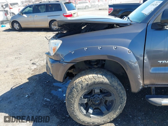 2014 Toyota Tacoma with VIN 5TFLU4EN1EX108137, listed as a IAAI auction lot 41691253 with 119,820 mi miles. Bid and sale history available at carsss.com. Image 19.