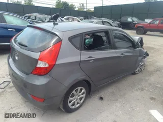 2014 Hyundai Accent GS with VIN KMHCT5AE1EU196151, listed as a IAAI auction lot 36939825 with 62,578 mi miles. Bid and sale history available at carsss.com. Image 4.