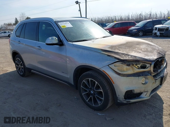 2018 BMW X5 xDrive35i with VIN 5UXKR0C51J0X92651, listed as a IAAI auction lot 41724974 with 83,496 mi miles. Bid and sale history available at carsss.com. Image 1.