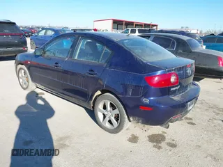 2006 Mazda 3 i with VIN JM1BK12F861468765, listed as a IAAI auction lot 41672325 with 247,918 mi miles. Bid and sale history available at carsss.com. Image 3.