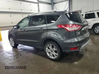 2015 Ford Escape Titanium with VIN 1FMCU9J90FUA26808, listed as a Copart auction lot 54449805 with 184,576 mi miles and Salvage title. Bid and sale history available at DreamBid. Image 2.