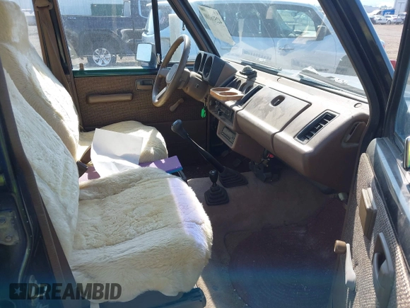 1990 Isuzu Trooper z VIN JACCH58EXL7903060, wystawiony jako IAAI lot #42516100 z przebiegiem 189 700 mil mil oraz . Historia ofert i sprzedaży dostępna na DreamBid. Obrazek 5.