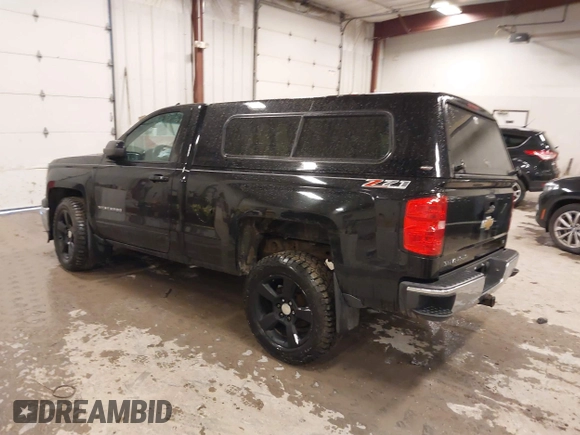 2015 Chevrolet Silverado 1500 LT with VIN 1GCNKREC7FZ176054, listed as a IAAI auction lot 41940955 with 197,857 mi miles and . Bid and sale history available at DreamBid. Image 3.