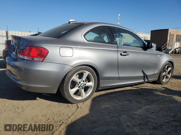 2010 BMW 1 Series 128i with VIN WBAUP9C54AVL89302, listed as a Copart auction lot 76716114 with 65,882 mi miles and Salvage Title. Bid and sale history available at DreamBid. Image 3.