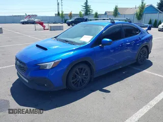 2022 Subaru WRX Premium with VIN JF1VBAF68N9027974, listed as a IAAI auction lot 42643496 with 46,734 mi miles and . Bid and sale history available at DreamBid. Image 2.