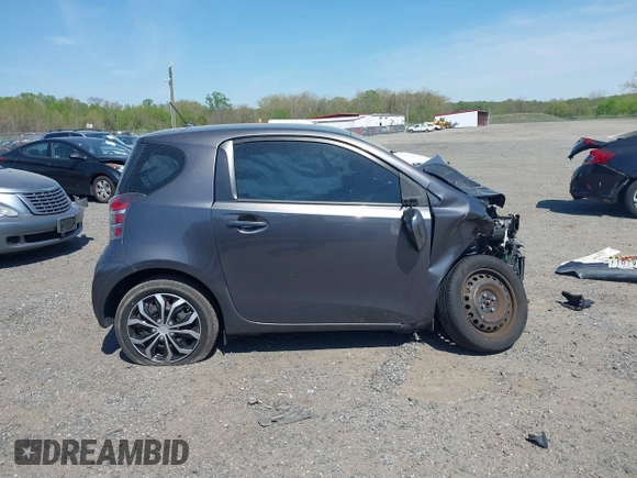 2012 Scion iQ z VIN JTNJJXB0XCJ013923, wystawiony jako IAAI lot #42109295 z przebiegiem 119 937 mil mil oraz . Historia ofert i sprzedaży dostępna na DreamBid. Obrazek 13.