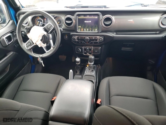 2023 Jeep Gladiator Overland with VIN 1C6HJTFG1PL515353, listed as a Copart auction lot 88072265 with 32,301 mi miles and Salvage Title. Bid and sale history available at carsss.com. Image 8.