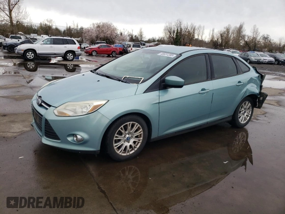 2012 Ford Focus SE with VIN 1FAHP3F21CL142407, listed as a Copart auction lot 48551205 with 174,935 mi miles and Salvage Title. Bid and sale history available at carsss.com. Image 1.