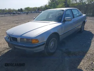 1998 BMW 7 Series 740il with VIN WBAGJ8324WDM11469, listed as a IAAI auction lot 42069641 with 1 mi miles. Bid and sale history available at carsss.com. Image 2.