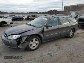 2002 Ford Taurus z VIN 1FAFP59S62A256119, wystawiony jako Copart lot #79581164 z przebiegiem 57 128 mil mil oraz Tytuł czysty. Historia ofert i sprzedaży dostępna na DreamBid. Obrazek 1.
