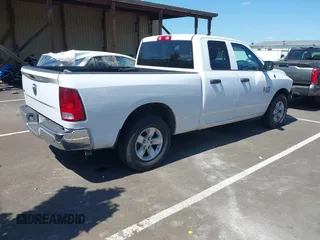 2024 Ram 1500 Classic SLT with VIN 1C6RR6GG4RS135980, listed as a IAAI auction lot 42086911 with 31,001 mi miles. Bid and sale history available at carsss.com. Image 4.