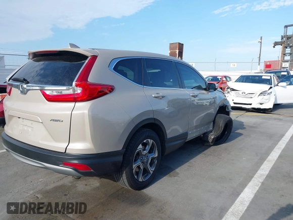 2017 Honda CR-V EX-L with VIN 5J6RW2H85HL022012, listed as a IAAI auction lot 40020013 with 94,450 mi miles. Bid and sale history available at carsss.com. Image 4.